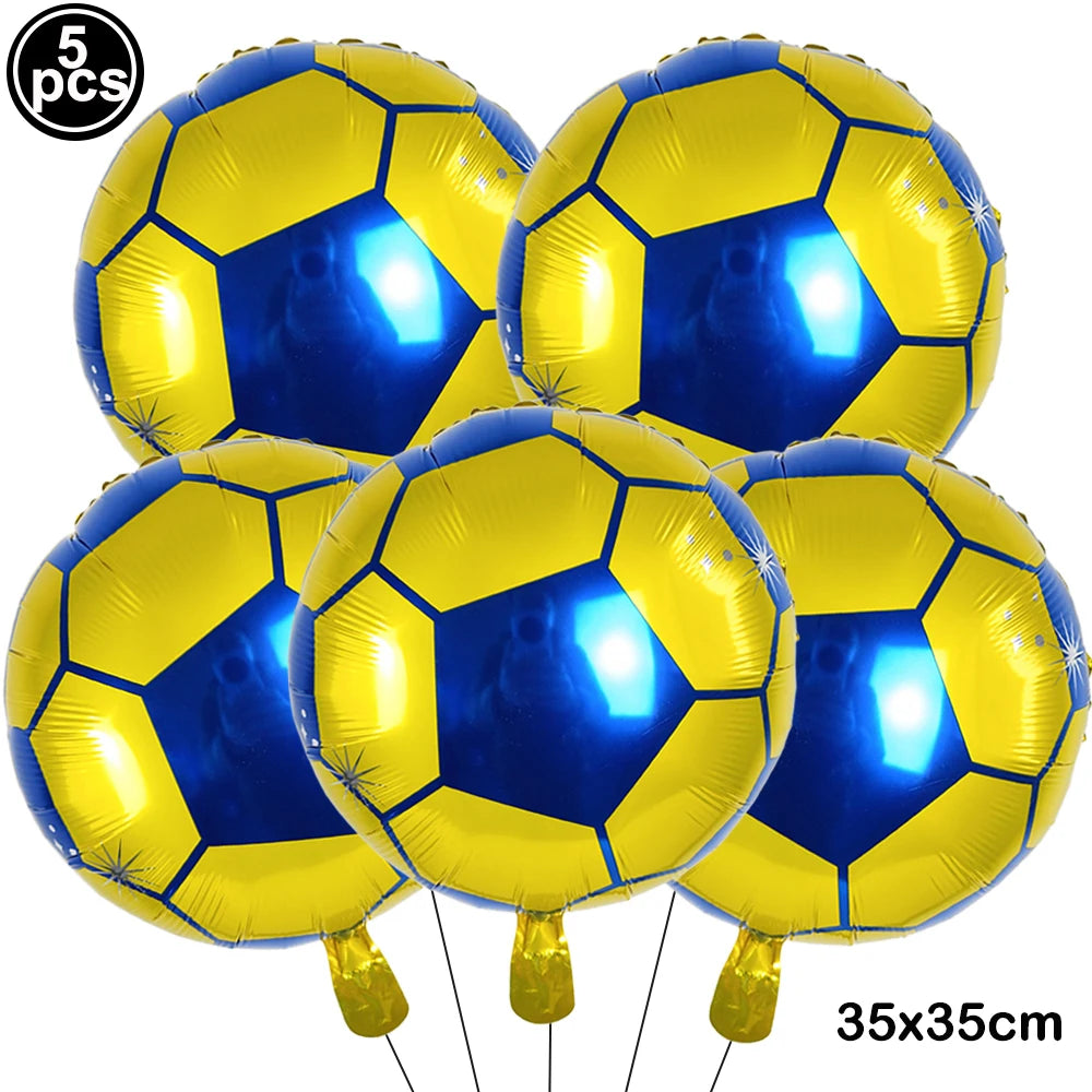 Five yellow and blue inflatable soccer balls used for party decoration