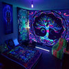 A dark room featuring a Tree of Life tapestry glowing with vibrant purple and blue light on the wall.
