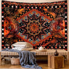 Bohemian sun and moon tapestry wall hanging featuring intricate geometric patterns in orange, black, and gold.