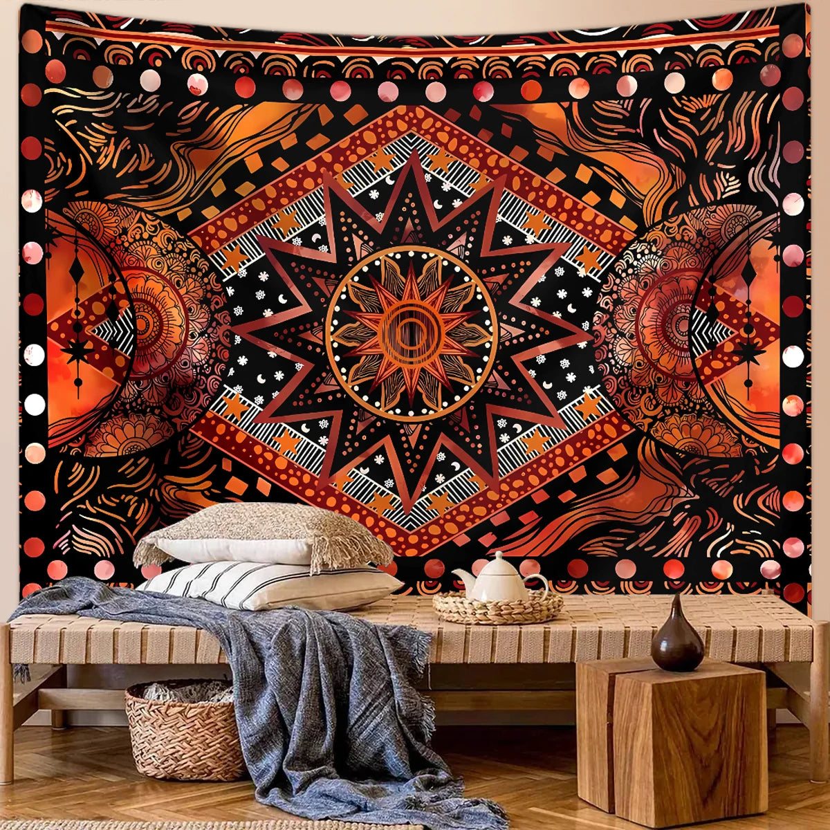 Bohemian sun and moon tapestry wall hanging featuring intricate geometric patterns in orange, black, and gold.