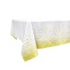 White disposable party table linen featuring a gold polka dot pattern.