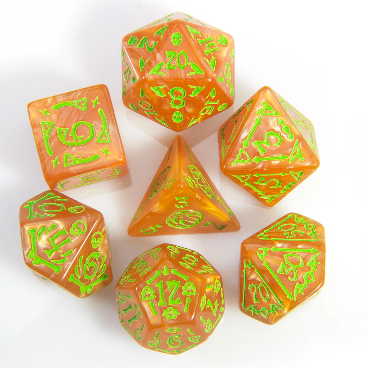 A set of seven polyhedral dice in shades of orange and green, arranged on a white surface.