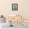A framed artwork featuring a red and black butterfly on a blue background, displayed on a wooden table.