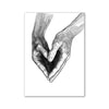 A grayscale line drawing of two hands clasped together forming a heart shape.