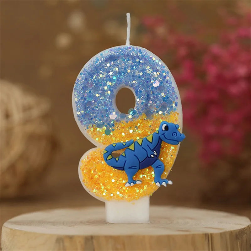A birthday candle shaped like the number 9 featuring a blue dinosaur on an orange background.