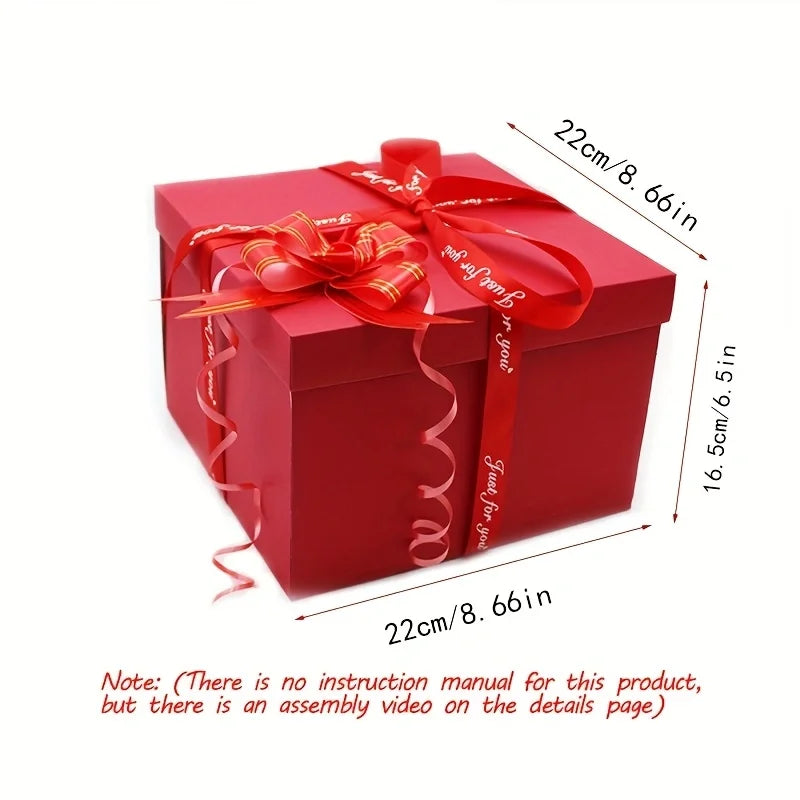 A red party gift packaging box tied with a gold ribbon, shown from the top angle.