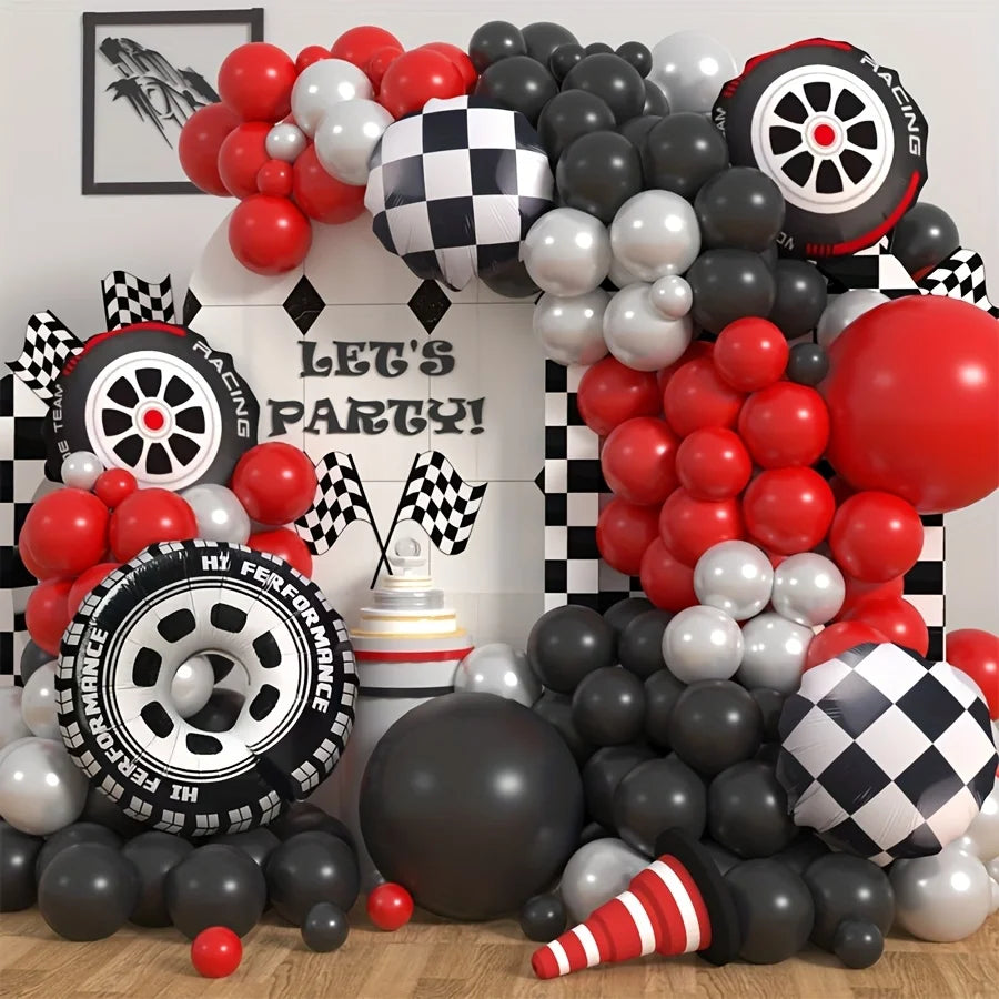 A balloon garland arch kit featuring red, black, and white latex balloons shaped like tires and other automotive themes.