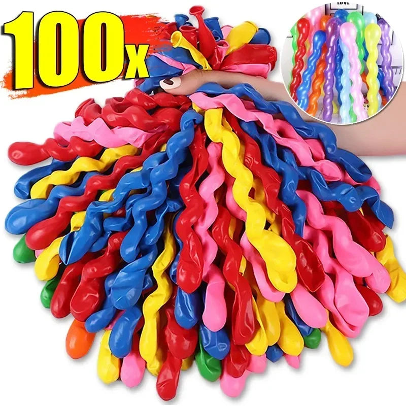 A large collection of colorful spiral twist latex balloons in various bright colors is displayed.