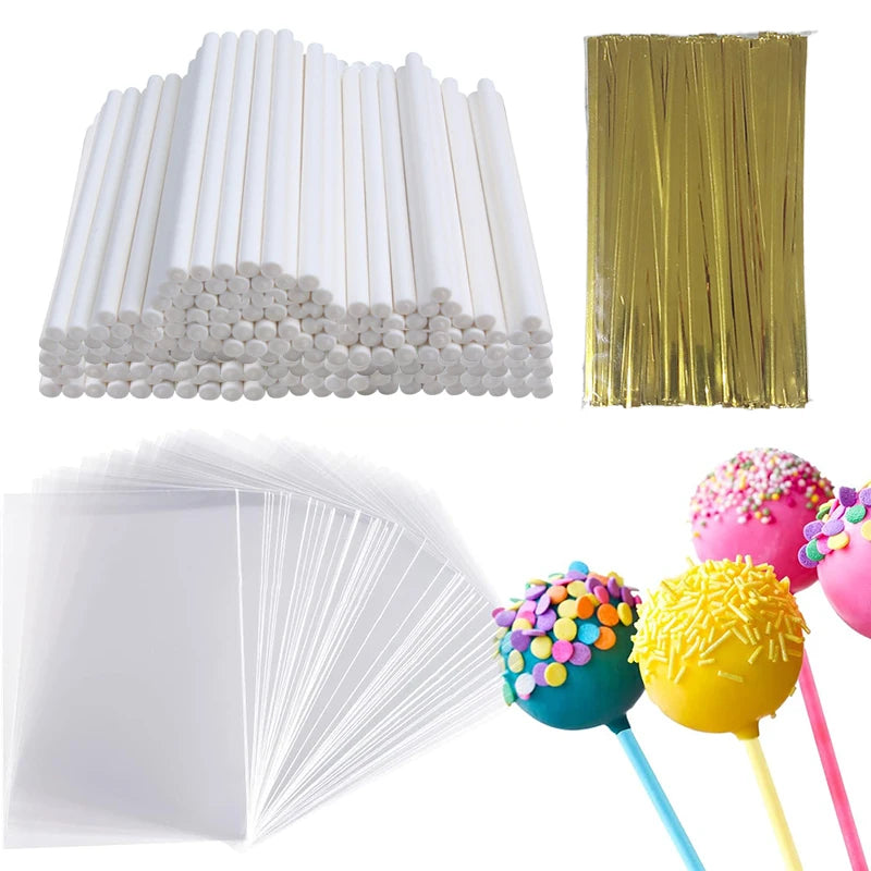 A collection of white paper lollipop sticks, a gold foil strip, and colorful lollipops.