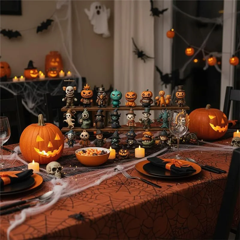 A table set with carved pumpkins, Halloween decorations, and candles for a spooky countdown box.