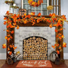 An autumn leaf garland with LED lights is displayed on a fireplace mantel decorated with fall foliage and firewood.