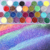 A collection of 32 colorful glitter mixes in small containers for nail art and DIY crafts