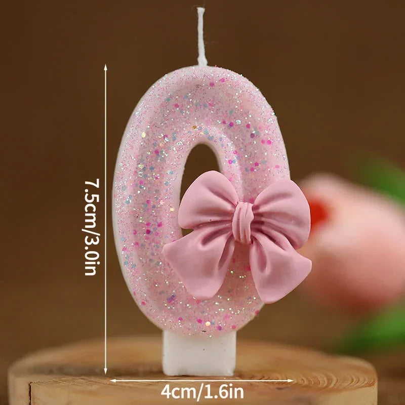 Topper de pastel número 6 de brillo rosa con lazo en base blanca