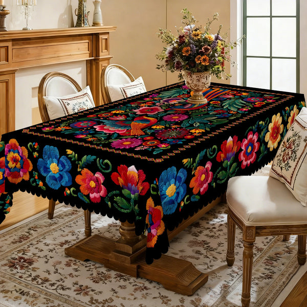 A vibrant Mexican style embroidered tablecloth featuring colorful floral patterns on a wooden dining table.