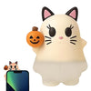 A white cat-shaped ghost phone decoration charm with black ears and a carved pumpkin detail.