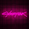 A neon pink cyberpunk text sign hangs against a dark grid background.