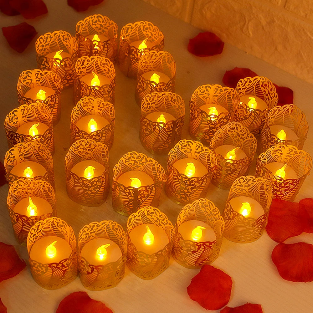 A collection of glowing orange paper lampshade tea light candles arranged on a white surface.