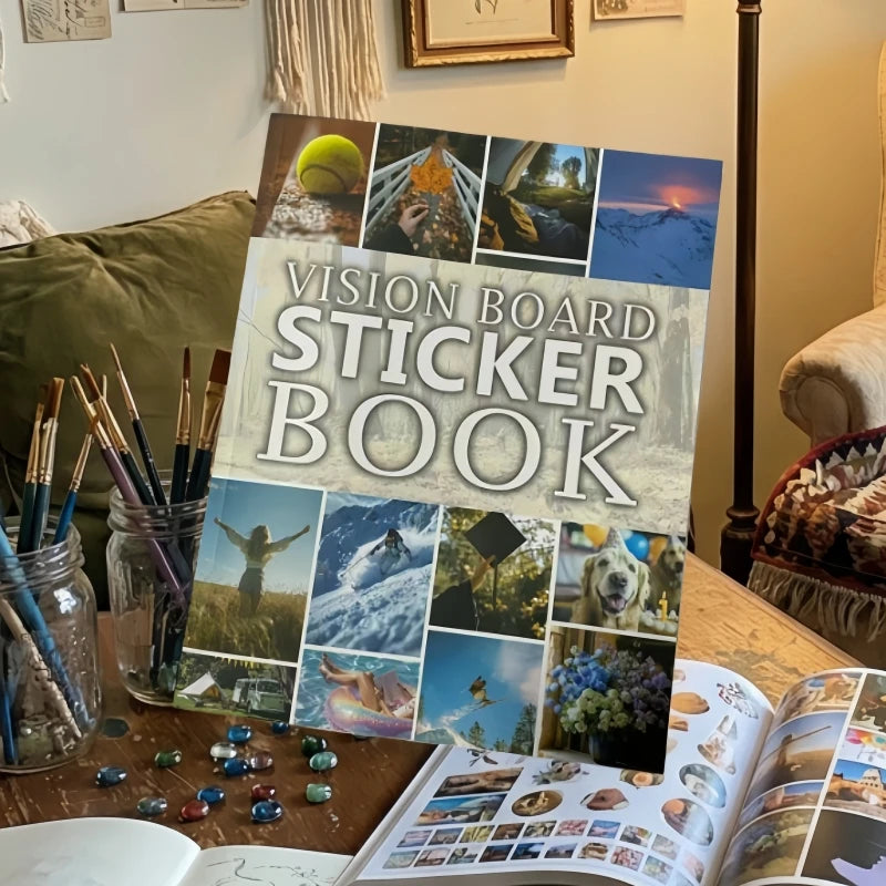 A photo of a Vision Board Sticker Book with inspirational stickers and quotes displayed next to an open book.
