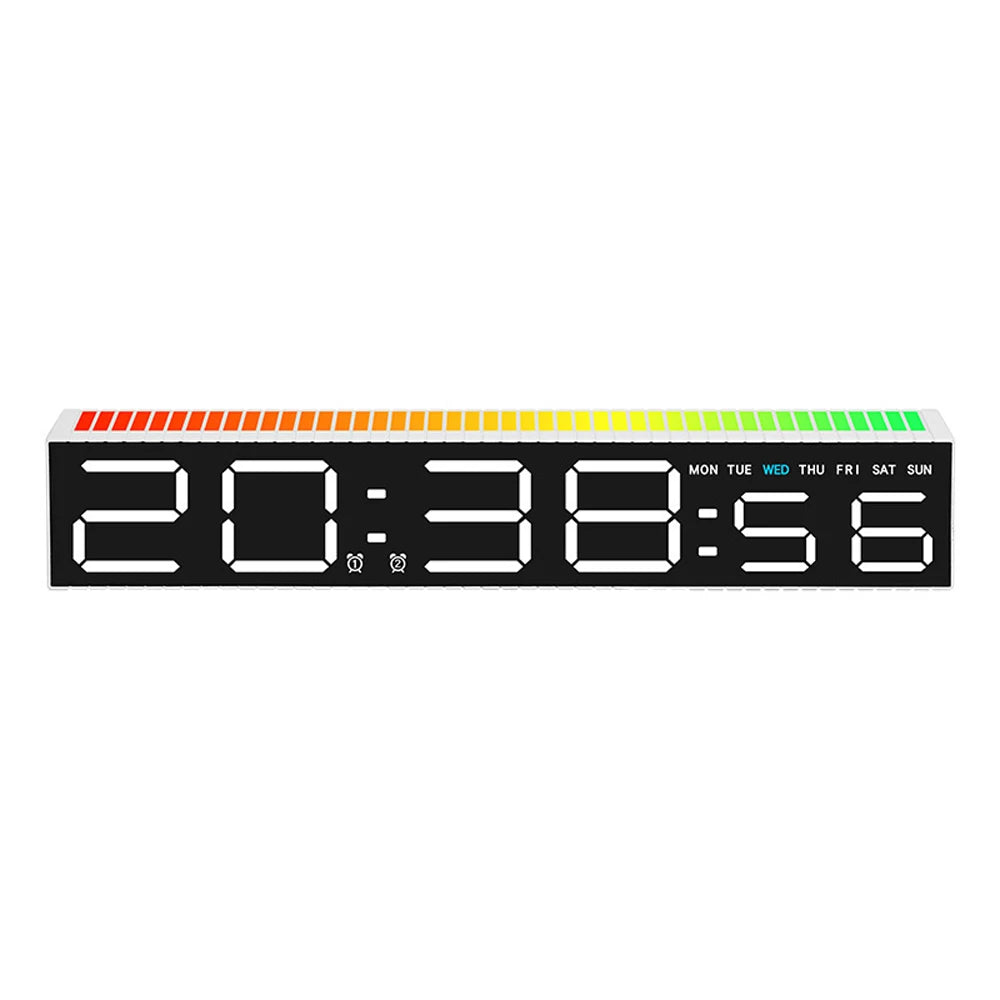 A digital alarm clock display showing the time 20:38:56 on a black background with an orange light bar above it.