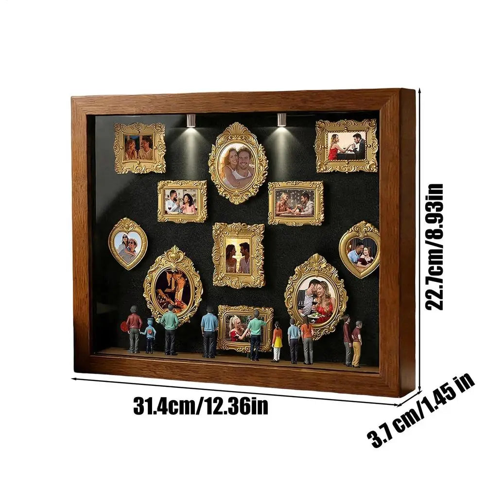A wooden display case featuring framed photos and figurines illuminated by LED lights.