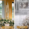 Candelabre en acrylique élégant avec bougies en verre et arrangements floraux pour centre de table ou mariage.