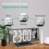 A digital projection alarm clock displaying time, calendar, and thermometer functions.