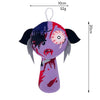 A purple collectible plush toy featuring a stylized face with pink accents and black ears.