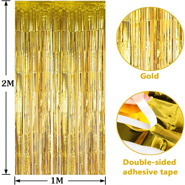 Vertical display of gold metallic tinsel foil fringe curtain backdrop with double-sided adhesive tape.