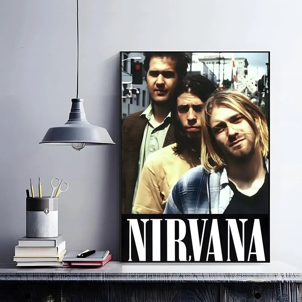 A framed poster featuring the band Nirvana with three male figures in a grunge style.