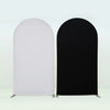 A pair of stretchable arch backdrop covers, one white and one black, displayed against a light background.