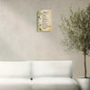 A framed piece of canvas wall art featuring a Bible verse, titled Salma 91, displayed on a light gray wall next to a large gr