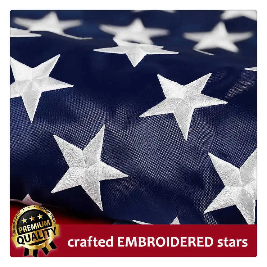 Navy fabric featuring white embroidered stars pattern.