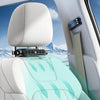 A car backseat cooling fan is installed in the seat, featuring a grille and a translucent panel with visible airflow graphics