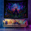 A vibrant tapestry featuring an alien astronaut figure surrounded by glowing purple, blue, and green psychedelic light.