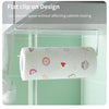 A white paper roll holder with various food-themed designs is shown inside a cabinet space.