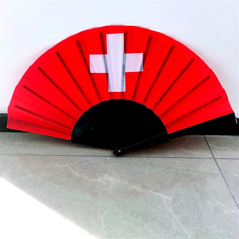 Red folding fan with a white cross design on the surface