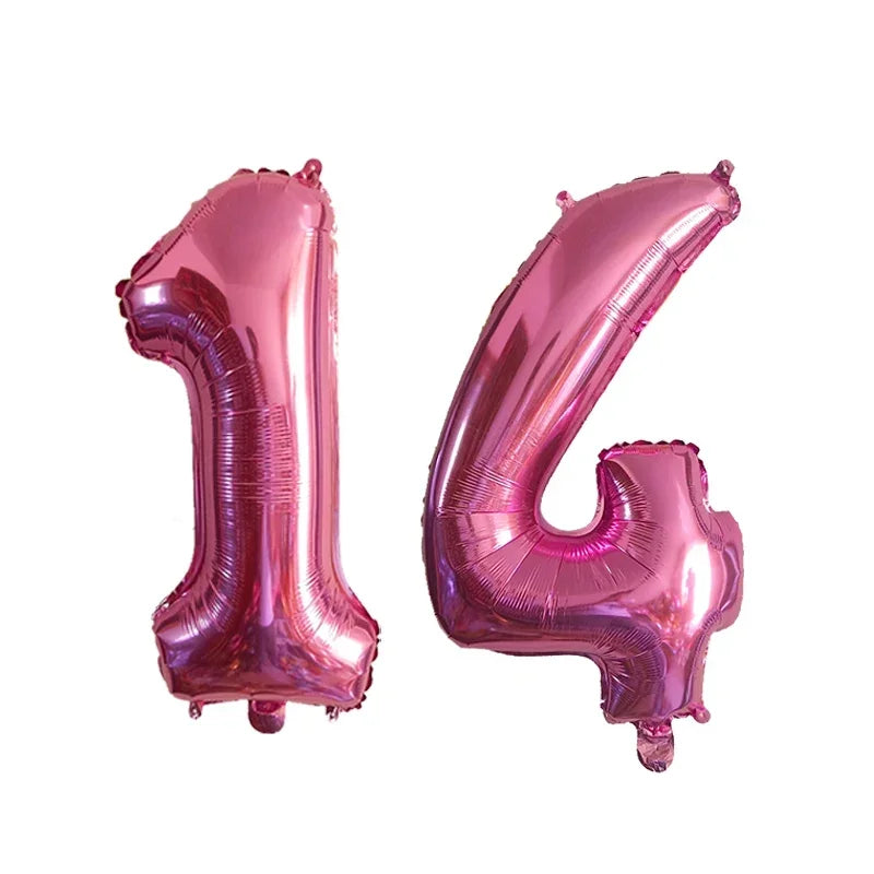 Two pink helium foil number balloons shaped like 1 and 4