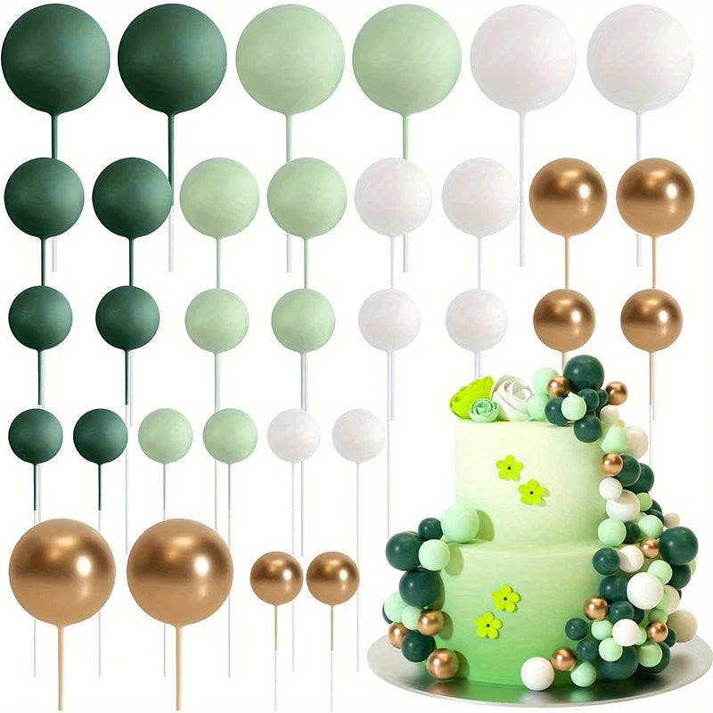 A set of 20 gold and green ball cake toppers on sticks.