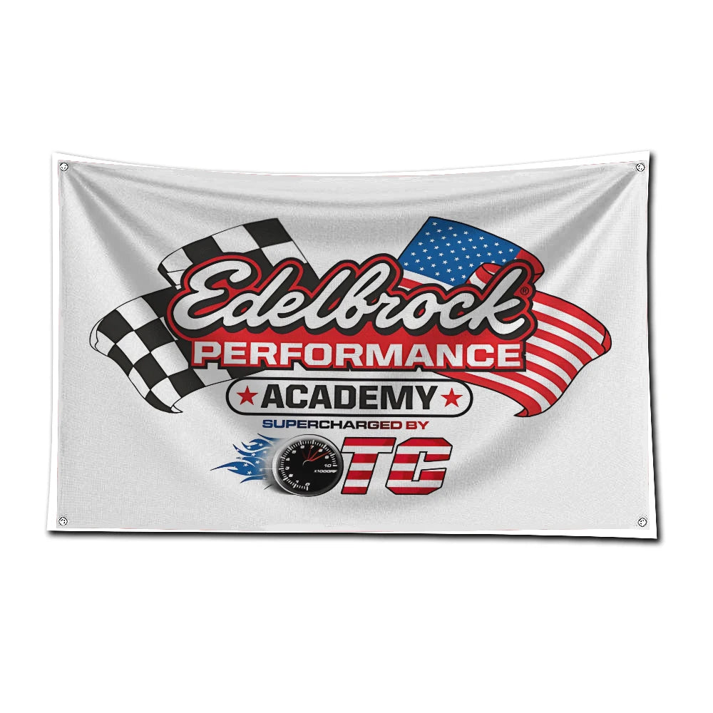 A white flag featuring the text Edelbrock Performance Academy and a red, white, and blue American flag design.