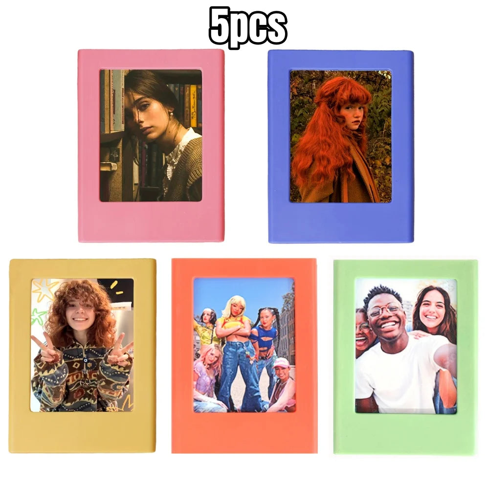 Five retro magnetic photo frames in pink, blue, yellow, orange, and green colors displaying different portraits.
