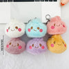 A collection of five fluffy, pastel-colored plush butter dumpling squishy keychains.