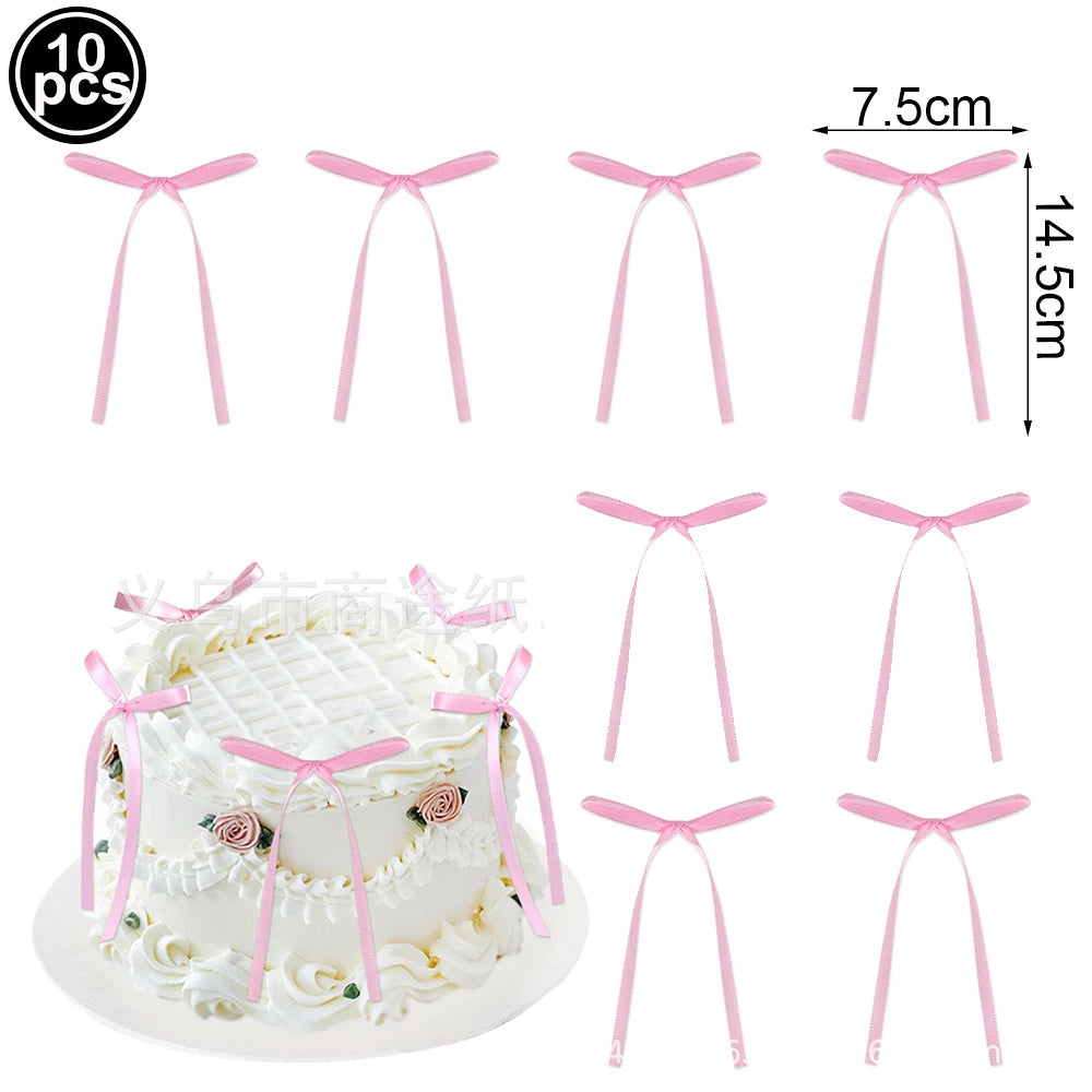A set of pink bow cupcake toppers for birthday and bridal shower decorations.