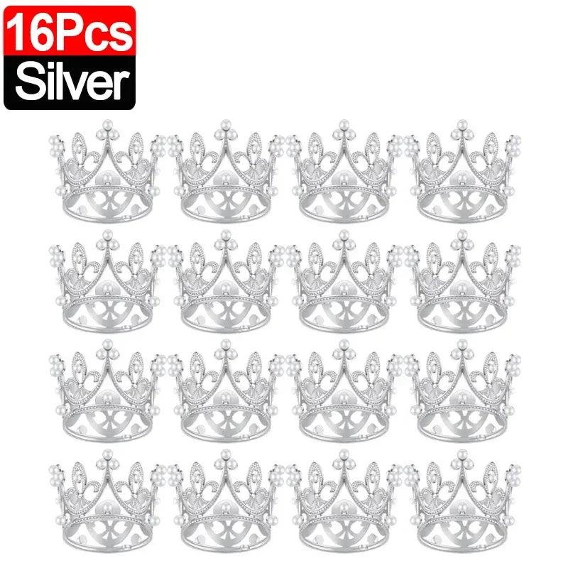 A set of 16 silver crown cake topper decorations.