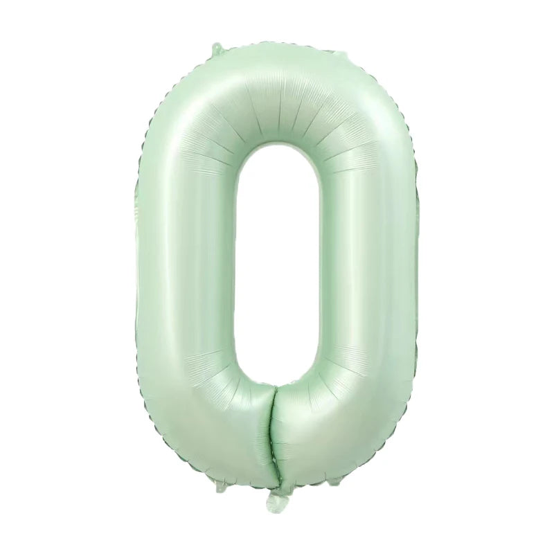 A light mint green foil number balloon shaped like the digit zero.