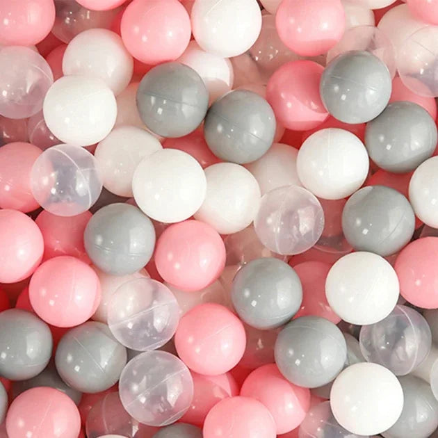 A close-up view of a 50-pack of colorful, translucent, and opaque star-shaped plastic balls in pink, white, and gray.