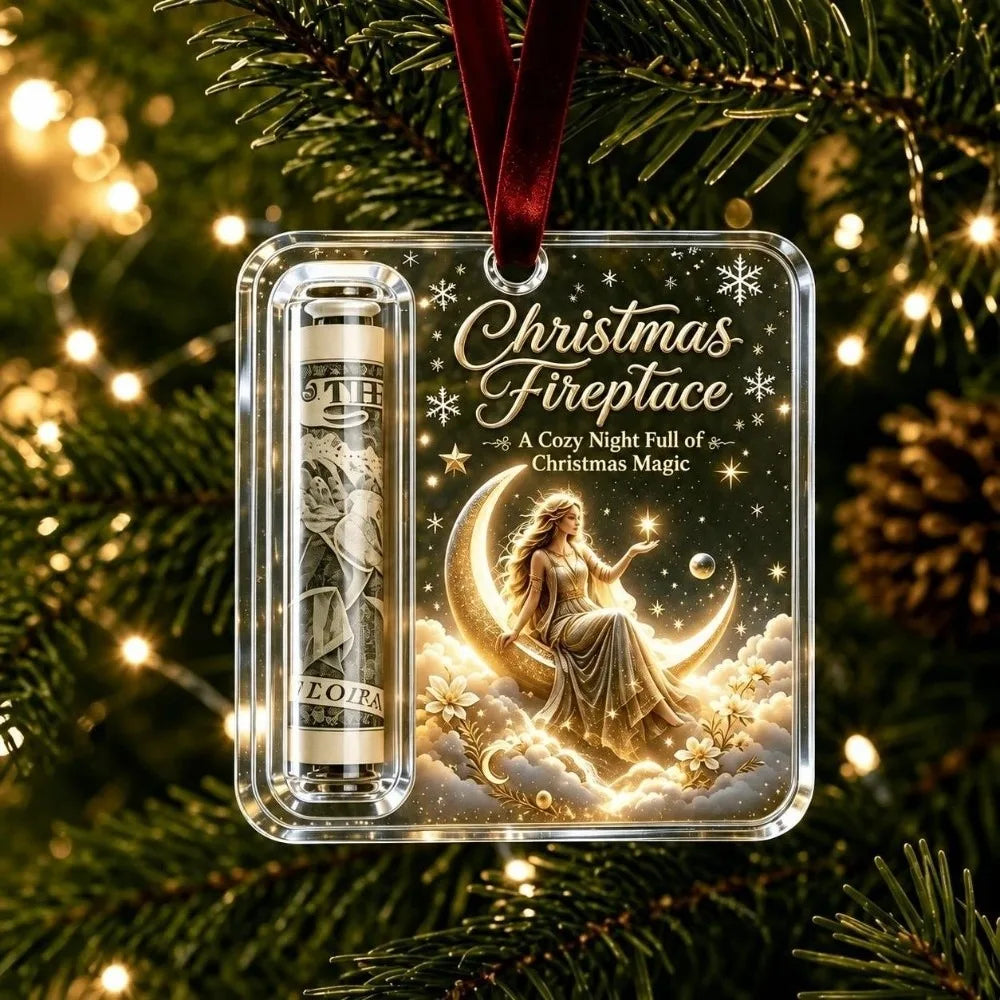 Clear acrylic ornament featuring a Christmas fireplace design with a gold silhouette of a woman and stars