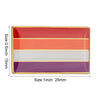 A rectangular lapel pin featuring five horizontal stripes of color: red, orange, white, and purple.