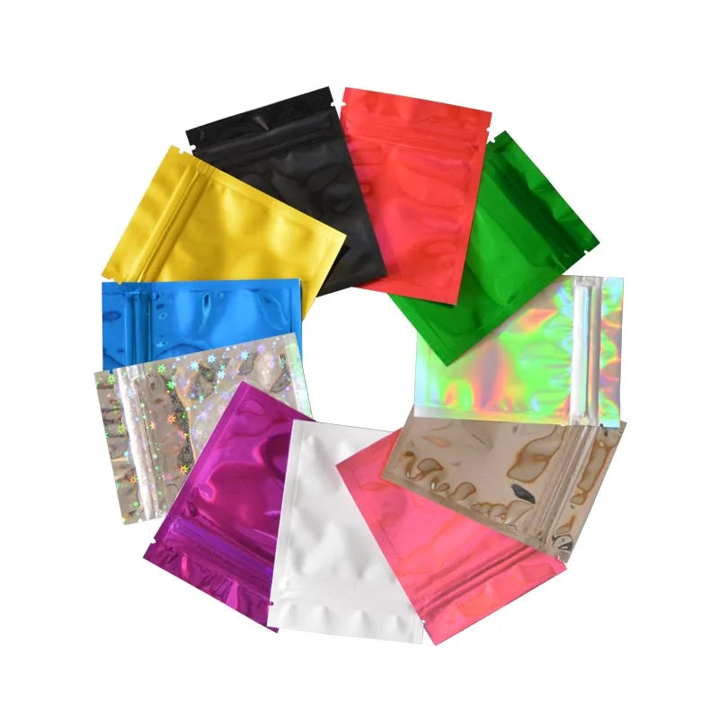 A collection of vibrant colored foil zip bags including yellow, black, red, green, blue, and pink.