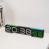 A black LED digital alarm clock displaying 20:38, set against a white background.