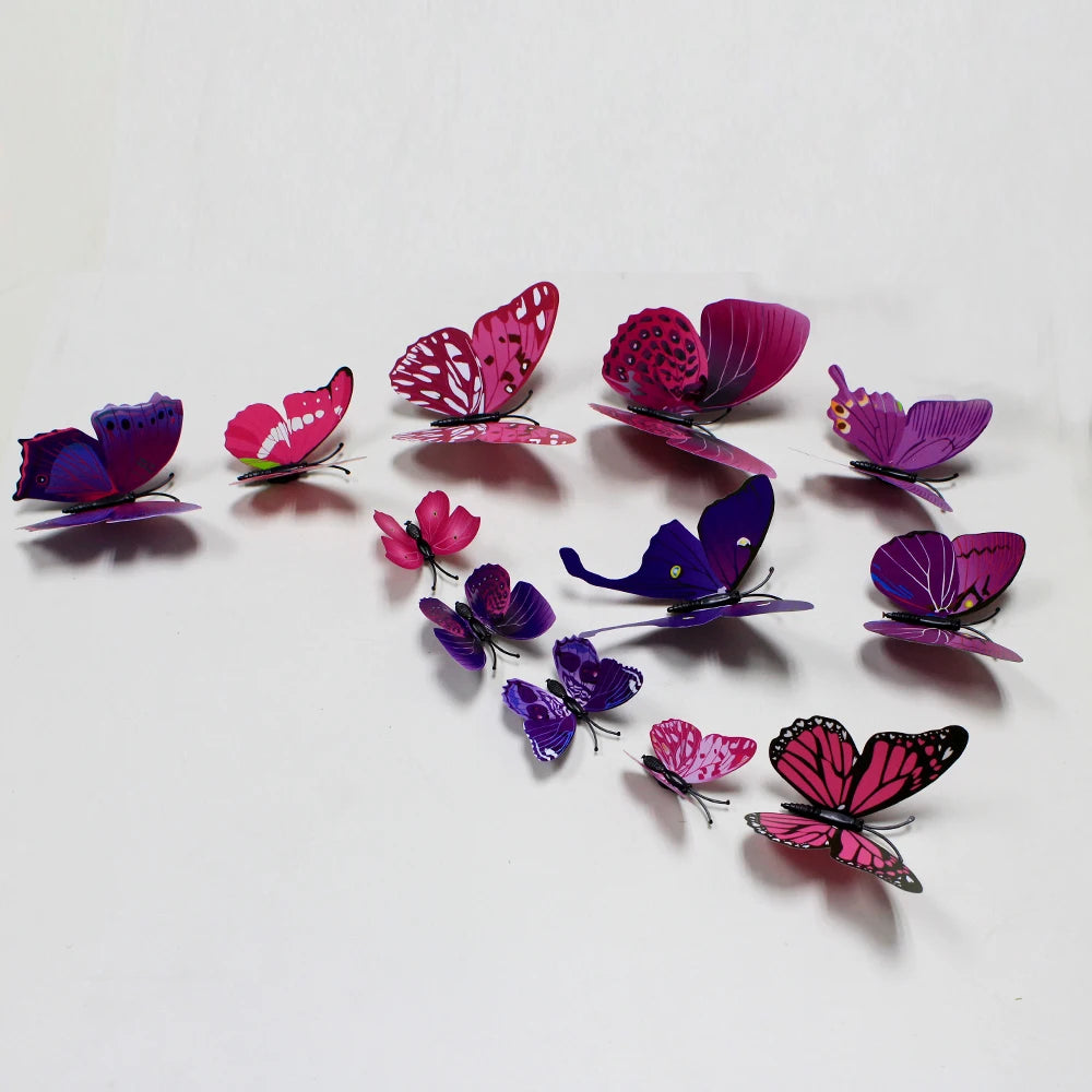 A collection of twelve colorful 3D butterfly wall decor stickers in shades of pink, purple, and magenta.